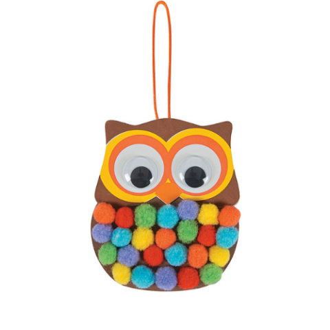 owl with googly eyes and pom poms on body