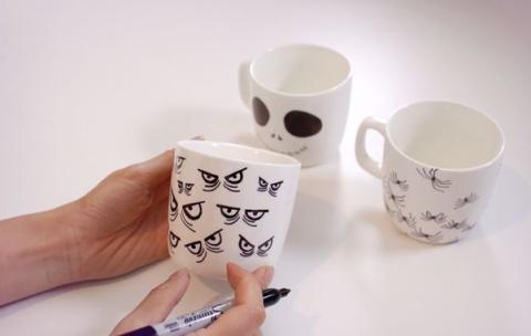 decorating a mug with Halloween themes
